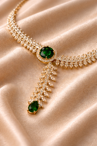 Emerald Green centerpiece with cascading leaf-inspired design AD Diamond Set