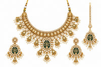 Gold-tone Kundan necklace, earrings and maang tikka with dark enamel floral centres, clear stones and white pearl-style drops.