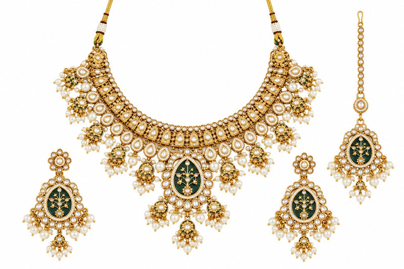 Gold-tone Kundan necklace, earrings and maang tikka with dark enamel floral centres, clear stones and white pearl-style drops.